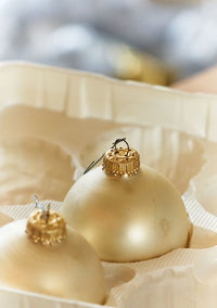 Close-up of baubles in container