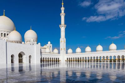 View of mosque against blue sky