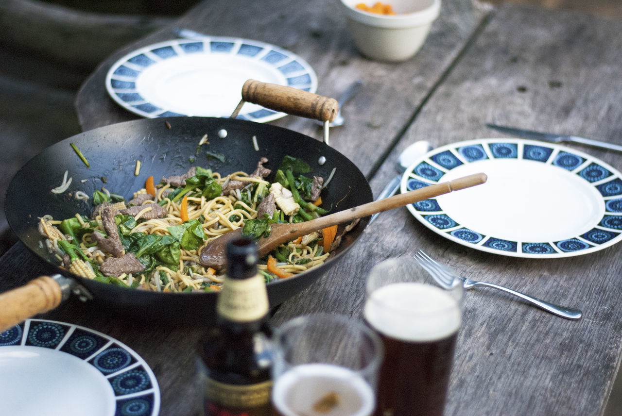 food and drink, food, kitchen utensil, indoors, freshness, table, healthy eating, selective focus, wellbeing, pasta, no people, vegetable, bowl, eating utensil, high angle view, household equipment, italian food, plate, close-up, meal