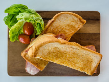 Directly above view of bread and vegetables on plate