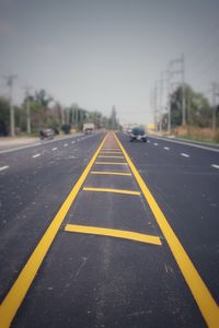 Surface level of road against sky