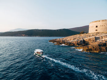 Scenic view of sea against clear sky