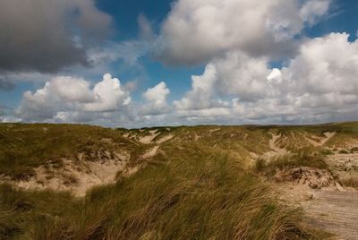 Scenic view of land against sky