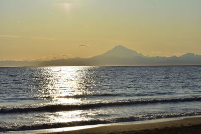Scenic view of sea against sky during sunset