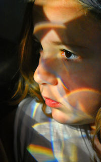 Close-up portrait of woman looking away
