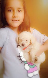 Portrait of cute girl with dog