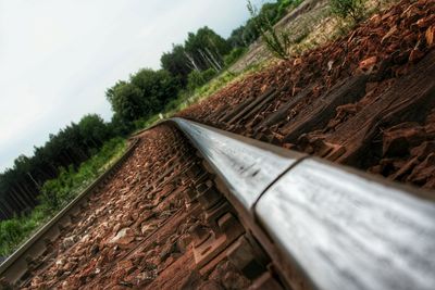 Railroad track passing through landscape