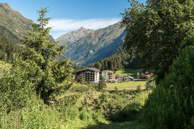 Scenic view of landscape and mountains against sky