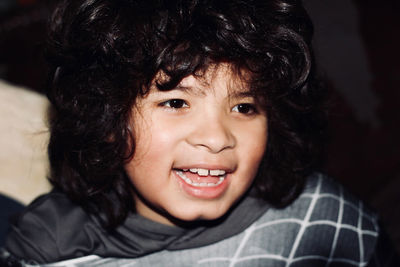 Close-up portrait of smiling boy