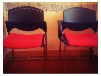 Empty chairs in a row