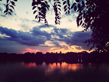 Scenic view of lake at sunset