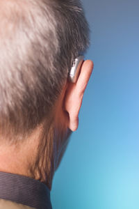 Close-up of man wearing hearing aid