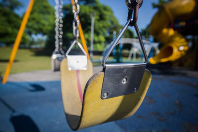 Close-up of swing at park