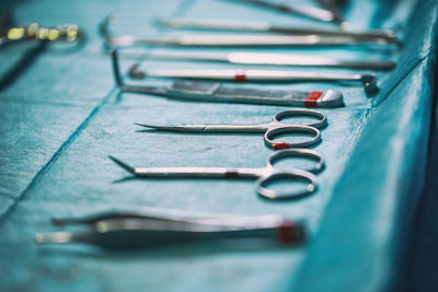 Close-up of surgical equipment on table