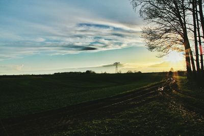 Scenic view of landscape against sky during sunset