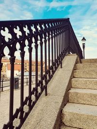 Staircase by building against sky