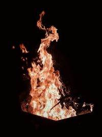 Close-up of fire in the dark