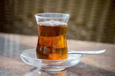 Close-up of tea in glass on table