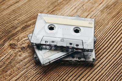 Tape cassettes. magnetic cassette tapes on wooden table. retro music style. 80s music party. vintage