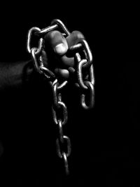 Close-up of chain on wall