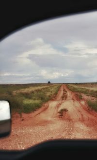 Road passing through forest