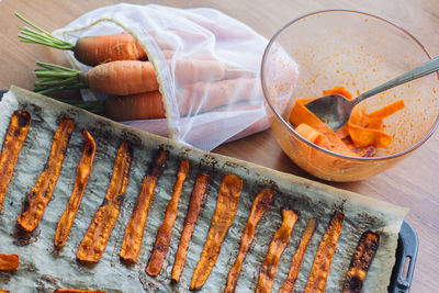 Fresh cooked carrot bacon is on the table. vegetarian food, meat replacement, protein