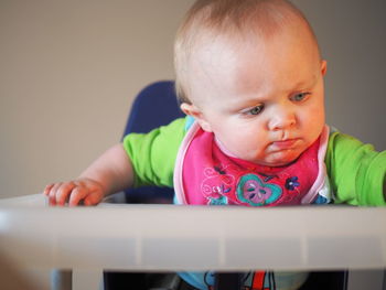 Portrait of cute baby boy at home