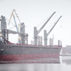 Commercial dock against clear sky