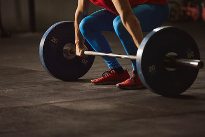 Midsection of man with camera