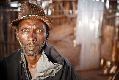 Close-up portrait of man wearing mask