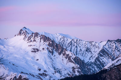 Scenic view of snow covered mountains