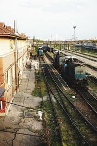 Train on railroad tracks against sky