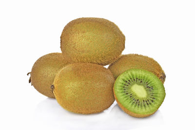 Close-up of bananas against white background