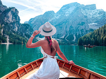 Full length of woman in lake against mountains