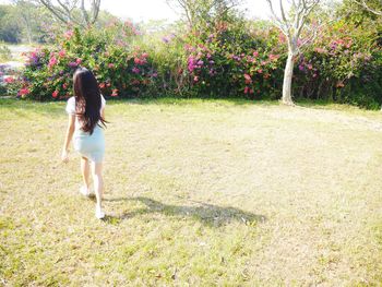 Woman standing on field