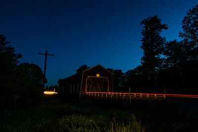Light trails on landscape at night