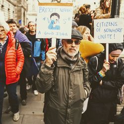 People standing on street in city