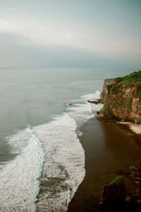 High angle view of sea against cloudy sky