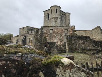 Low angle view of old building against sky