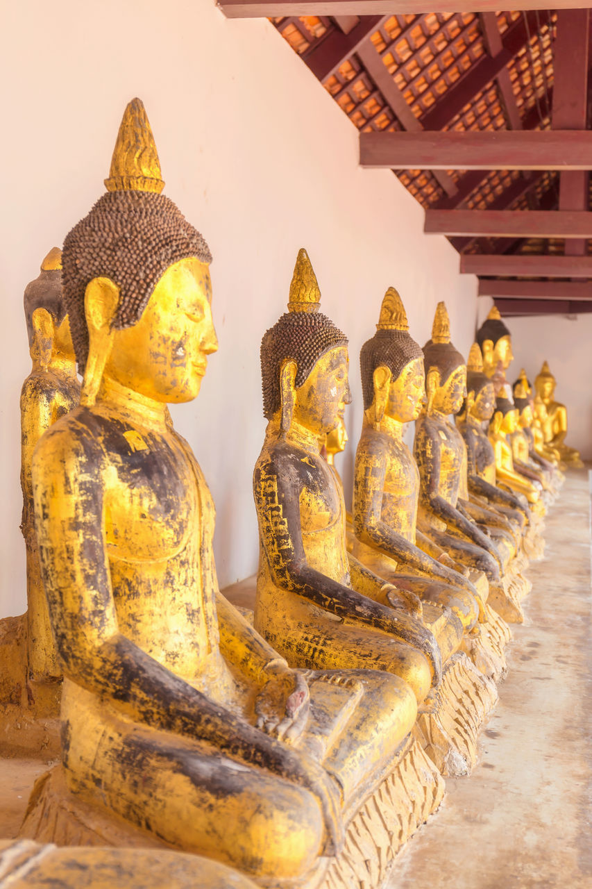 BUDDHA STATUE IN TEMPLE BUILDING