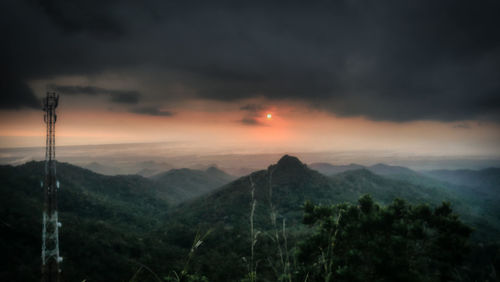 Scenic view of mountains against sky during sunset