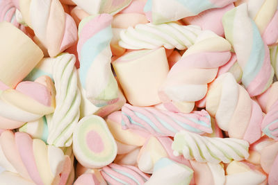 Multi-colored marshmallows. background or texture of colorful blue and pink marshmallows.