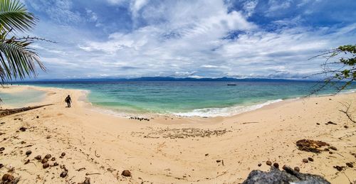 Scenic view of beach against sky