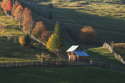 House on field during autumn