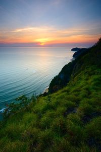 Scenic view of sea against sky during sunset