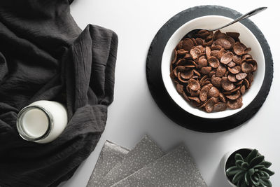High angle view of coffee cup on table