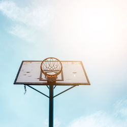 Low angle view of basketball hoop against sky