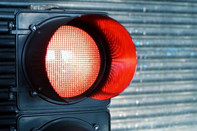 Close-up of red signal light