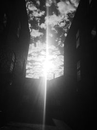 Sun shining through clouds