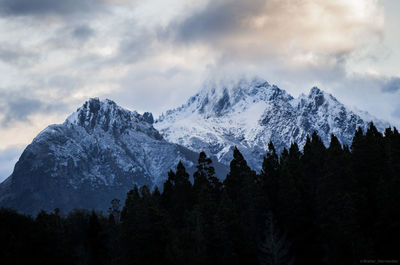 Idyllic shot of snowcapped mountains against sky